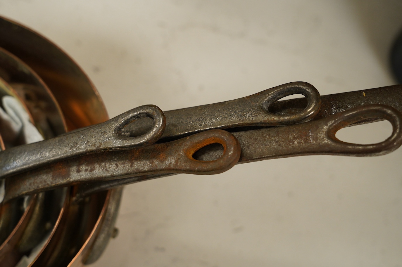 A set of five graduated copper pans, largest diameter 18cm. Condition - fair